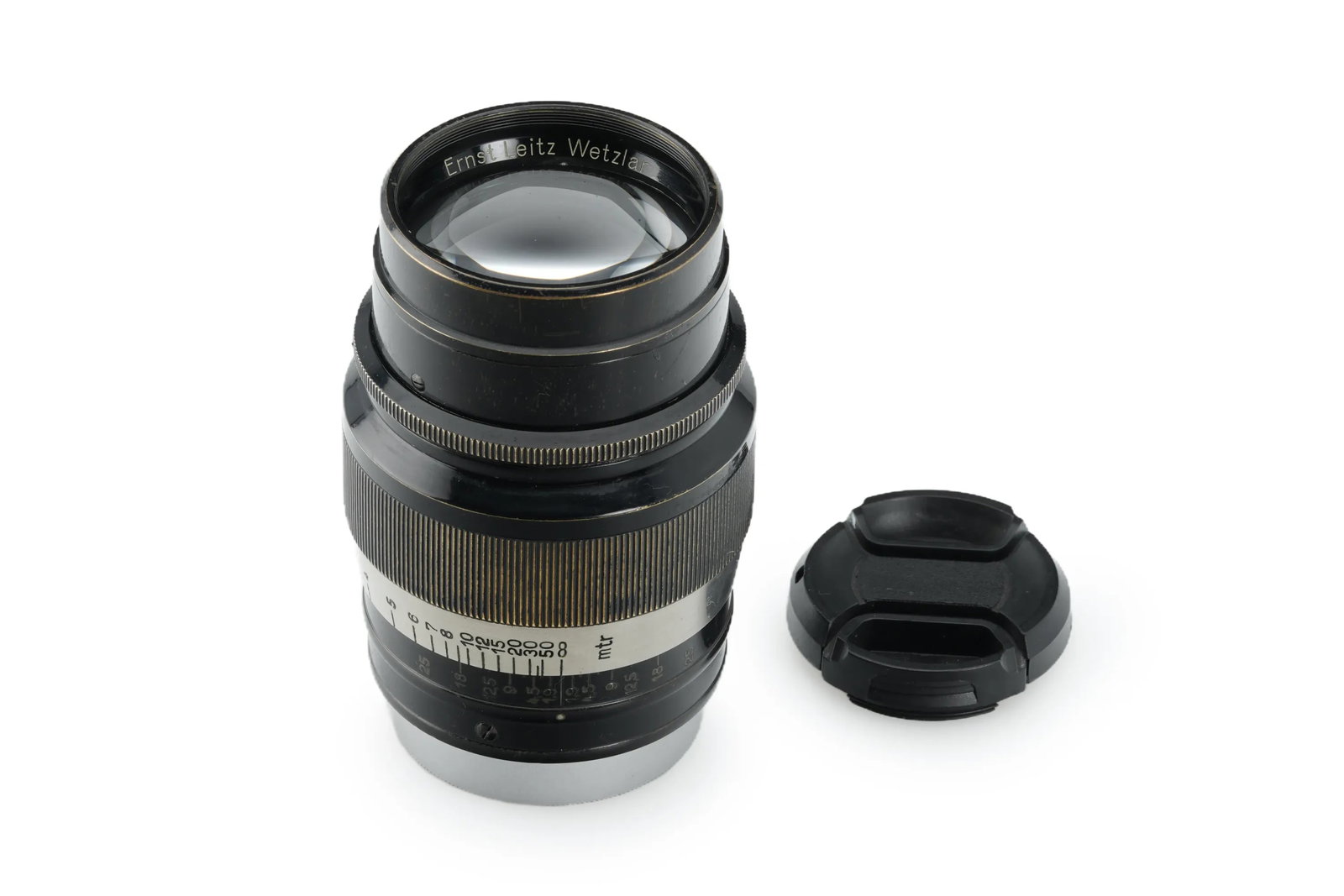 Leica Hektor 1.9/7.3cm HEKON: Presented in a black and nickel finish, this HEKON lens is a meter-scale, rotating mount version in good overall condition. The optics are very good, exhibiting only a few light cleaning marks. The