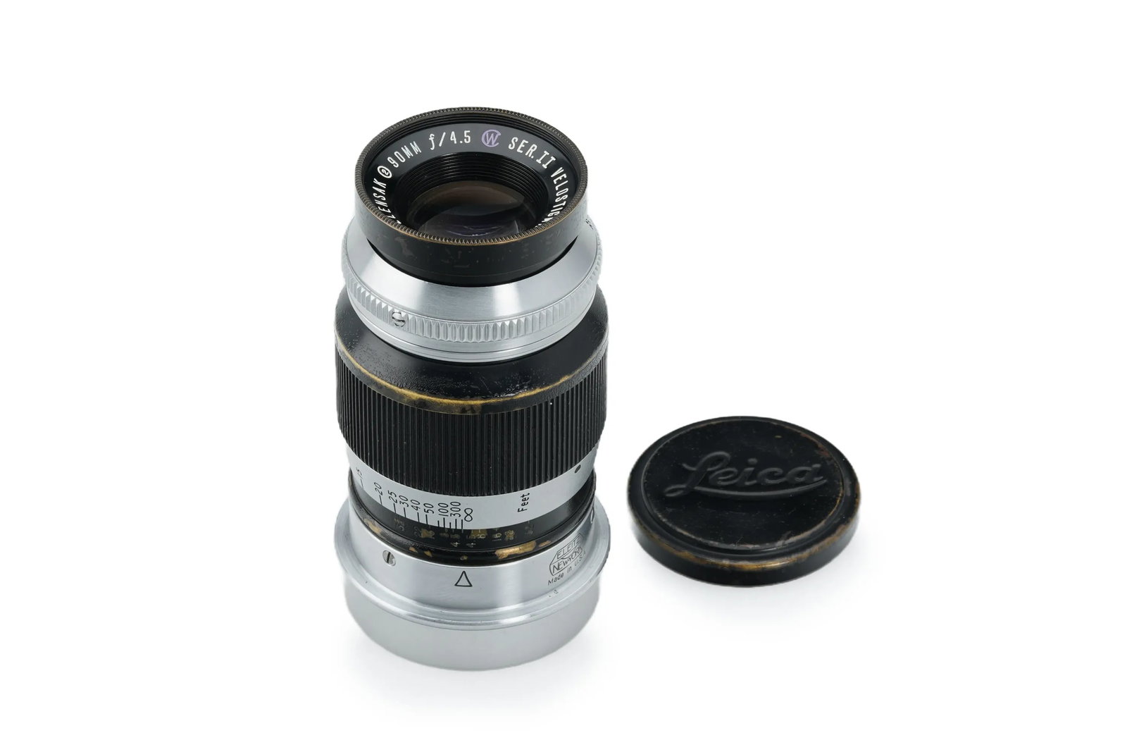 Wollensak f. Leica M39 Velostigmat Ser. II 4.5/90mm: A very rare telephoto lens for the post-war New York Leica Standard, in nice condition with good optics showing only slight haze and minimal dust. Accompanied by both caps.