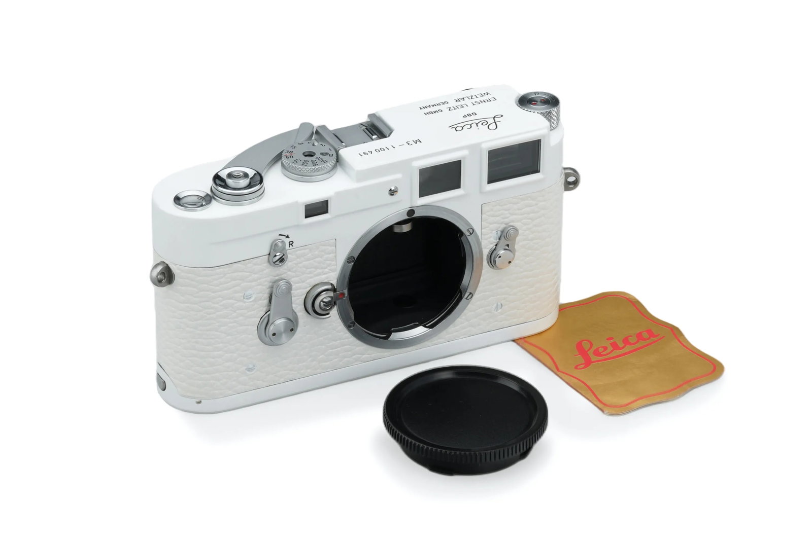Leica M3 Repainted White: Finished in a striking white repaint with white leather, this Leica M3 is presented in near-mint condition. A unique aesthetic take on the classic M-body, it remains highly well-preserved and comes