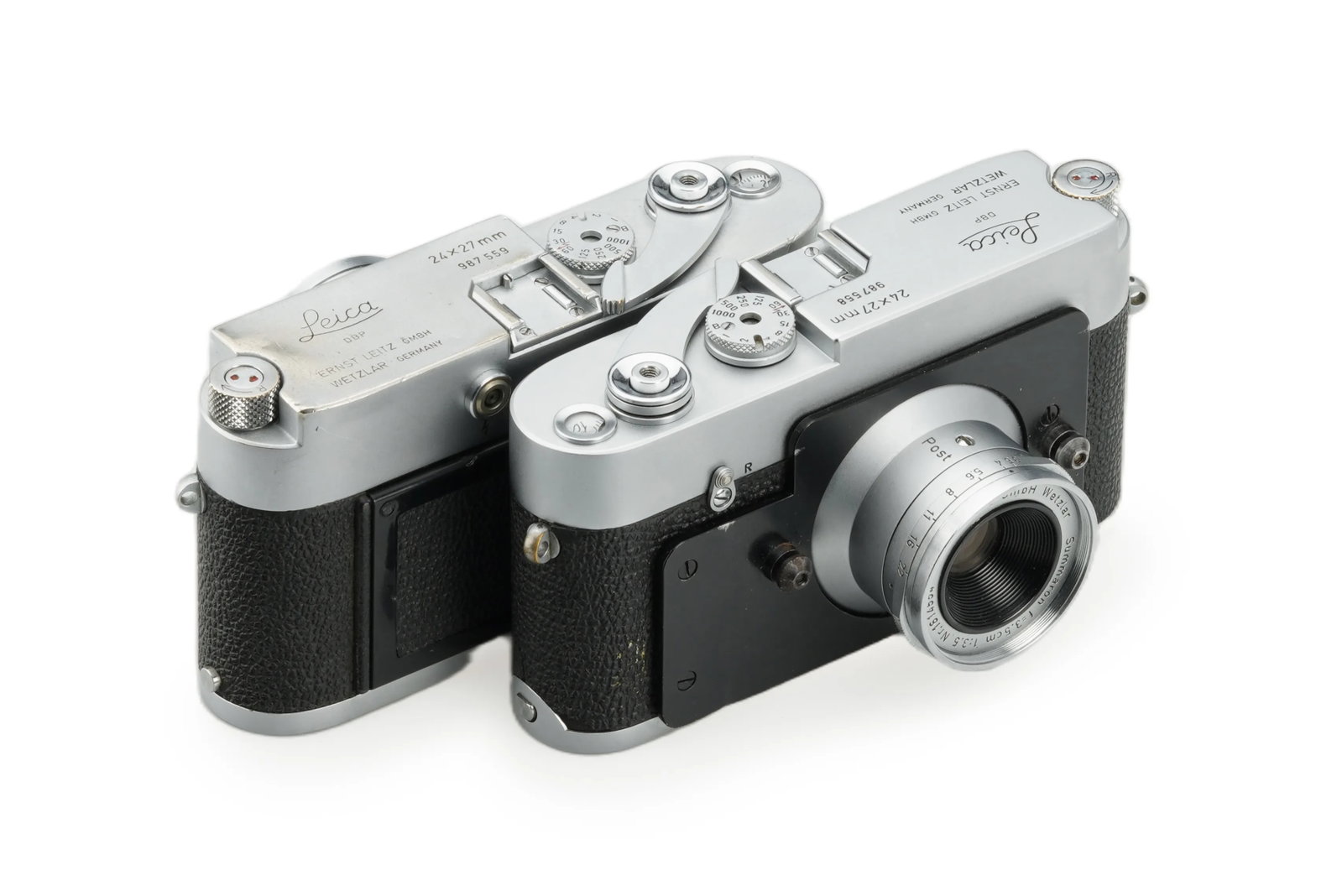 Leica MD Post 24x27mm Consecutive Pair: An exceptionally rare consecutive set featuring a pair of early Leica MD bodies(Nos. 987558 & 987559)paired with two Summaron 3.5/3.5cm lenses also bearing consecutive serial numbers(Nos. 1614553 & 16
