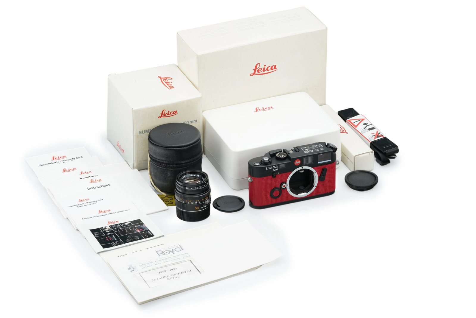 Leica M6 Black 'Royal-Foto Austria': Produced for Royal-Foto Austria as part of a highly exclusive run of only 101 units(combined black and chrome), this limited edition Leica M6 features a distinctive red leather covering. Bearing the s