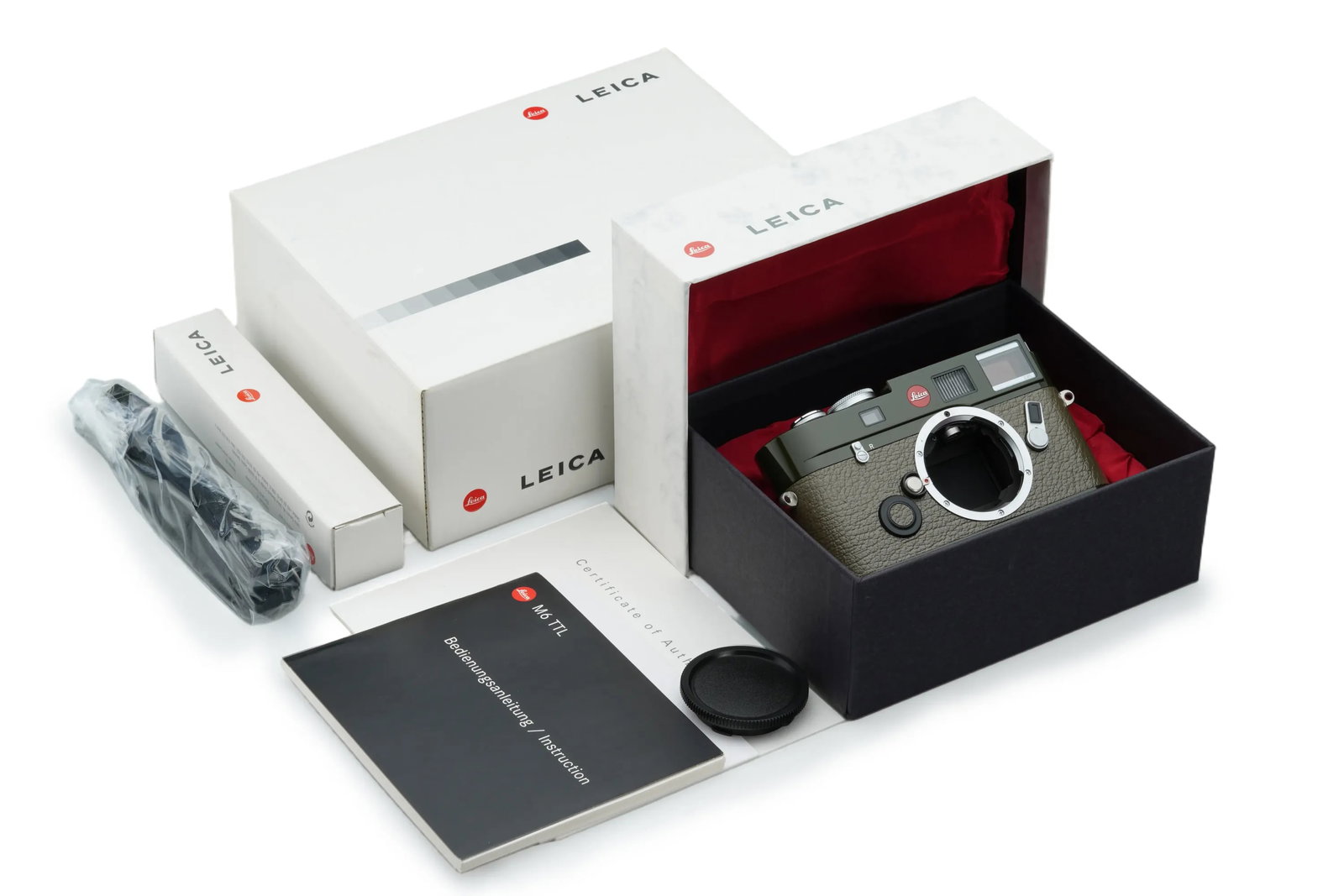 Leica M6 TTL 0.85 Green Paint Finish: Rare and unused, this Green/ Safari Paint M6 TTL is one of only 300 units commissioned for HK distributor Schmidt Photo. Numbered 071-300, the body uniquely combines a 0.85 viewfinder with classic M3-