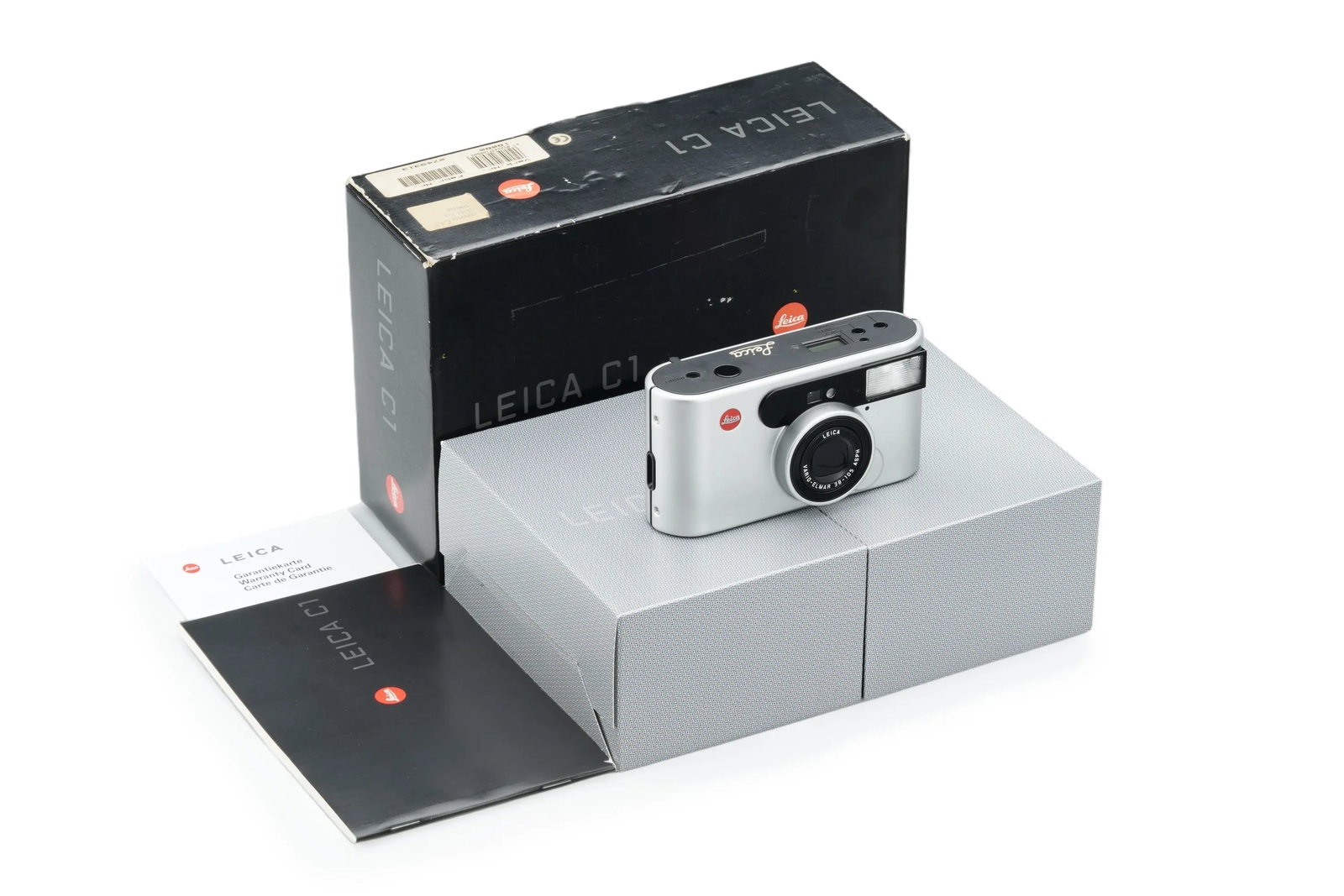 Leica C1 Silver 18080: A high-quality compact "point-and-shoot" film camera, this silver Leica C1 is preserved in near-mint condition and remains in full working order. It features a versatile 38-105mm f/4-10.5 Vario-Elmar 