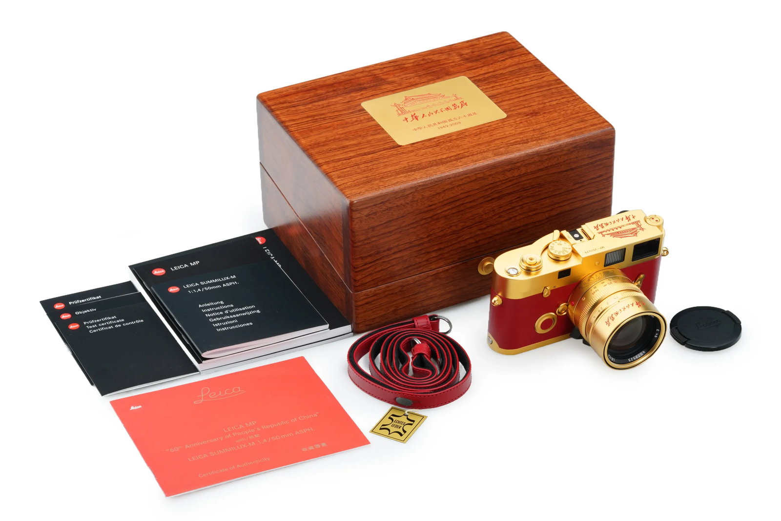 Leica MP Gold Edition '60 Years PRC': An extremely rare 24-carat gold-plated Leica MP set, this edition commemorates the 60th Anniversary of the People's Republic of China with a limited run of only 61 units. The camera body is wrapped in