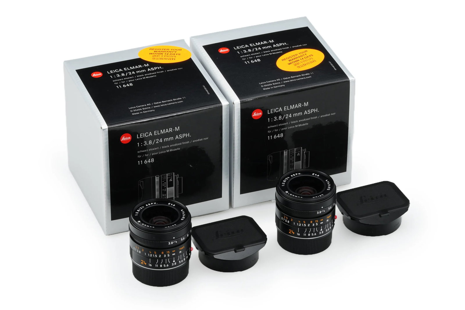 Leica Elmar-M 3.8/24mm ASPH. 11648 Consecutive Pairs: Presented in mint condition, these Elmar-M 3.8/24mm ASPH. units(Nos. 4141495 - 4141496)form a perfectly sequenced consecutive pair of modern wide-angle lenses. Both lenses are complete with all