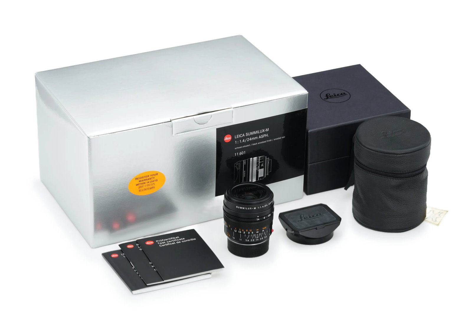 Leica Summilux-M 1.4/24 ASPH. 11601: A high-speed, wide-angle prime lens, this Leica Summilux 1.4/24mm ASPH. is presented in mint condition with clear optics. The lens comes complete with all papers, the leather pouch, and all boxes.