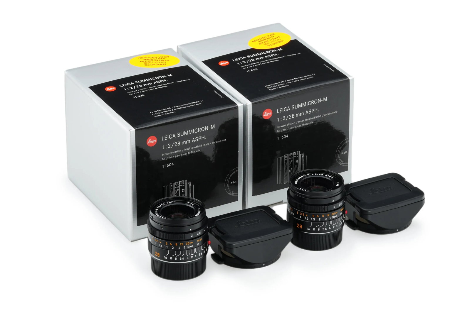 Leica Summicron-M 2/28mm ASPH. 11604 Consecutive Pairs: Comprising two perfectly sequenced units, this consecutive pair of Summicron M 2/28mm ASPH. lenses(Nos. 4193457 - 4193458)is offered in mint condition. These modern wide-angle primes includes all
