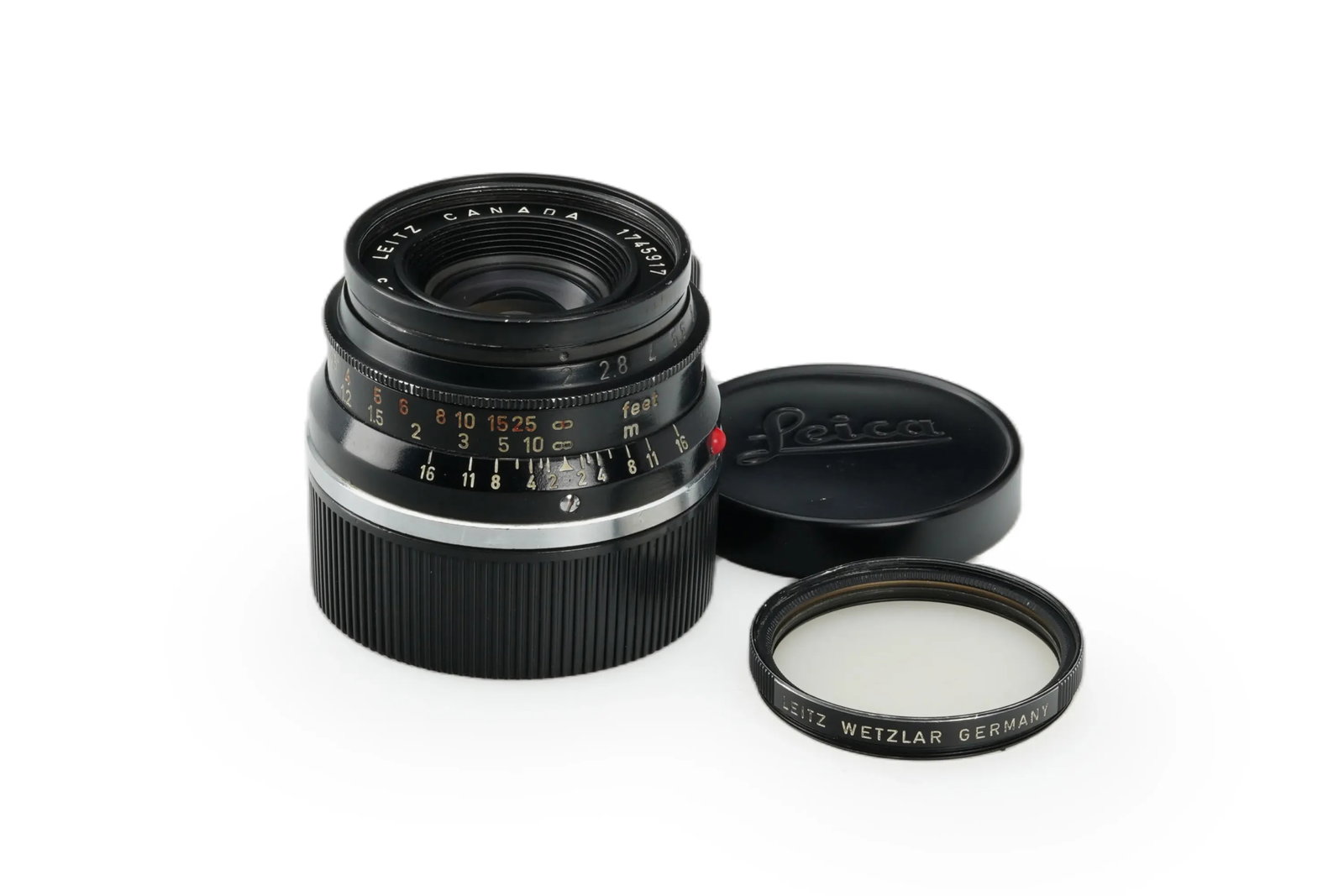 Leica Summicron 2/35mm Black Paint 8-Element: Distinguished by its classic black paint finish, this 8-element 35mm Summicron exhibits a beautiful aged character, with some historical paint touch-ups noted on the barrel. While the optical