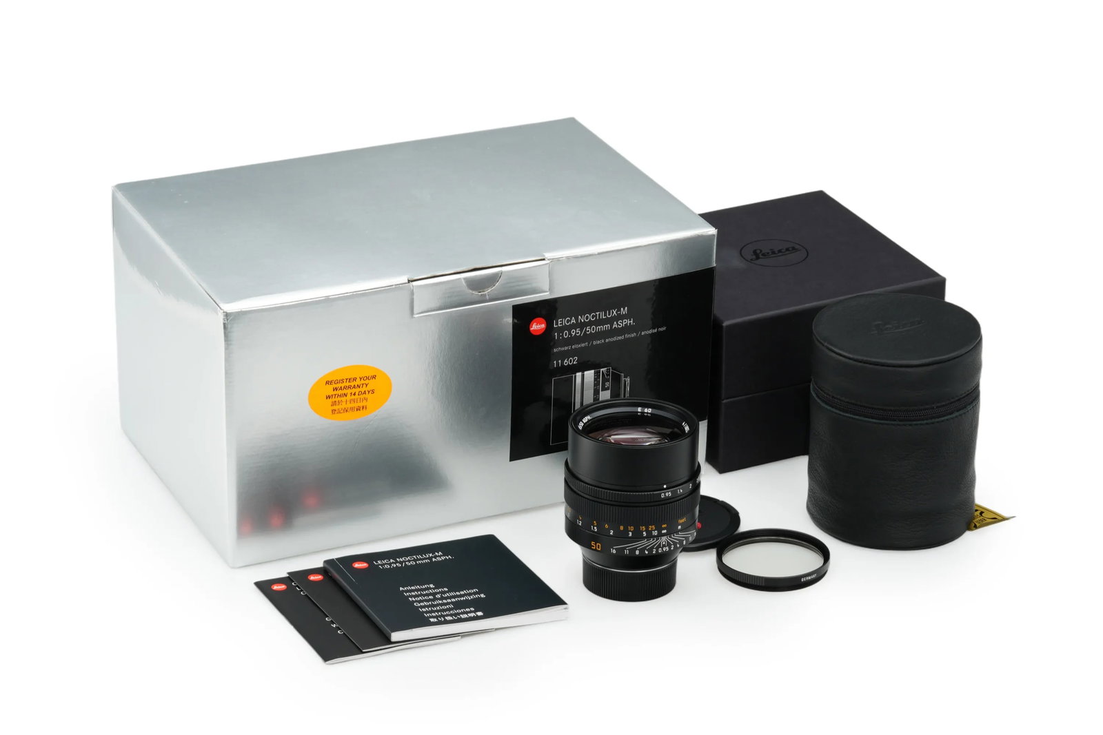 Leica Noctilux-M 0.95/50mm ASPH. 11602: The legendary Noctilux stands as the undisputed king of ultra-fast Leica lenses, this premier M-mount optic is presented in flawless mint condition. The complete set includes both caps, a filter, all