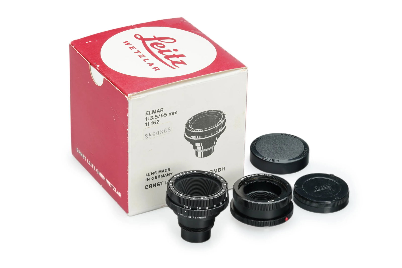 Leica Elmar 3.5/65mm Black: Finished in a classic black, this Elmar is paired with the 16464 universal focusing mount. The lens is in nice condition with good optics, showing only minimal signs of use on the barrel. It comes