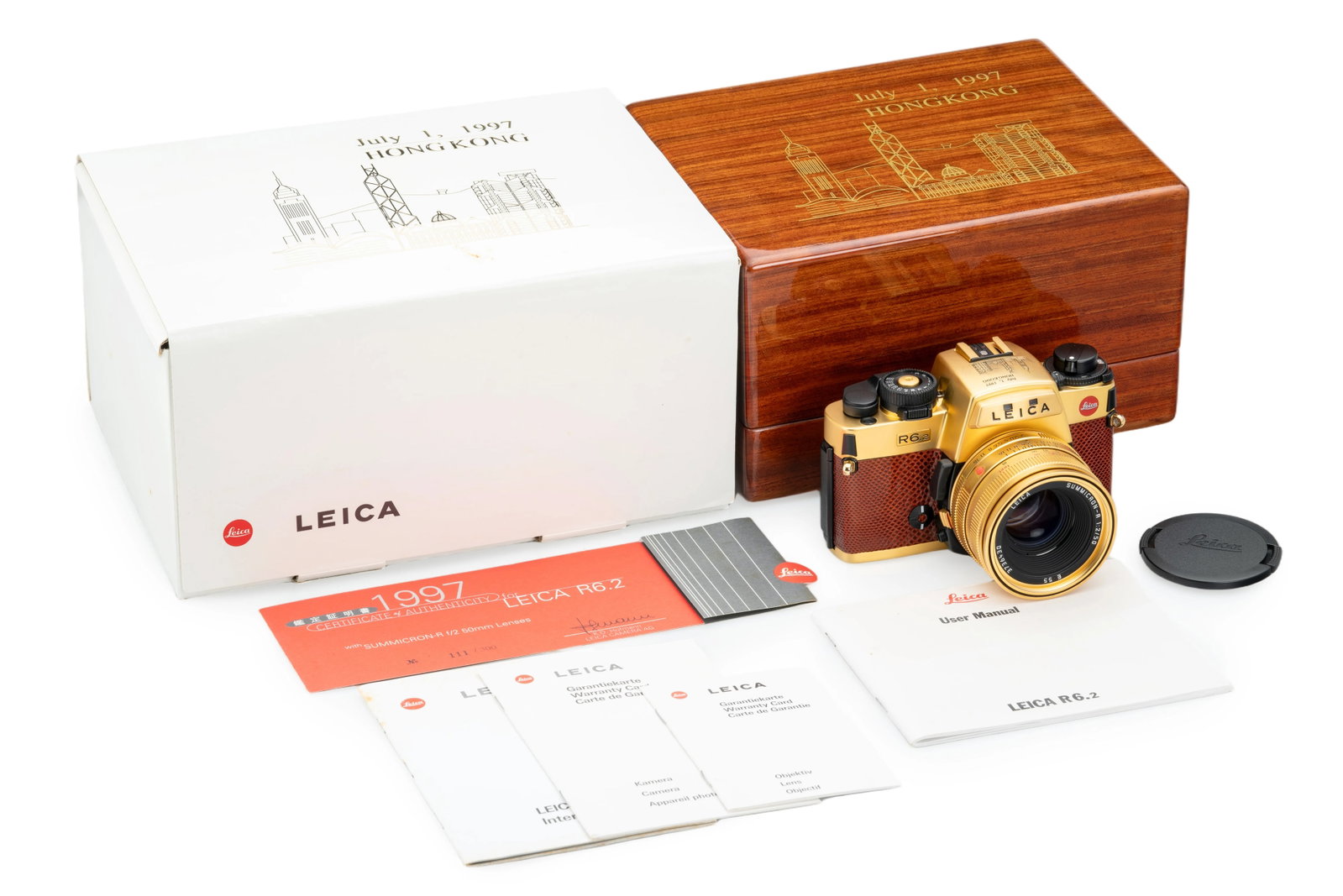 Leica R6.2 Gold Set: This special edition Leica R6.2 Gold set was issued in a strictly limited run of only 300 units to commemorate the 1997 return of Hong Kong to China. The set features a gold-plated R6.2 body(No. 21784