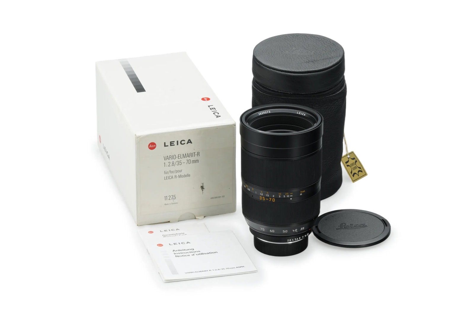 Leica Vario-Elmarit-R 2.8/35-70mm ASPH. 11275: One of only 600 units ever produced, this ROM zoom is offered in mint condition with perfect optics. The lot is complete with both caps, leather keeper, instruction manual, and the original maker's bo