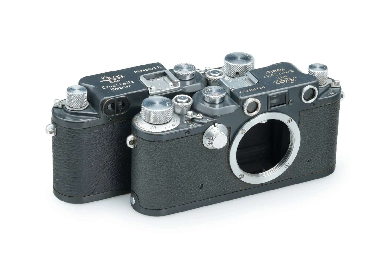 Leica IIIc Grey Consecutive Pair: Distinguished by the consecutive serial numbers 390602 and 390603, this beautiful pair of IIIc K grey cameras is in remarkable beautiful, original and unmodified condition. Although the "K" mark on th