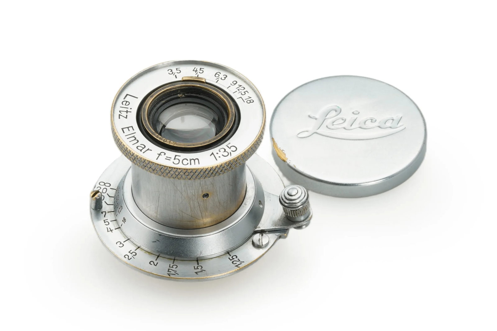 Leitz Elmar 3.5/5cm W.haven: A rare wartime uncoated Elmar 50mm, this lens retains significant military identification markings on the rear of the mount. It is in nice overall condition with clear optics, showing only minor clean