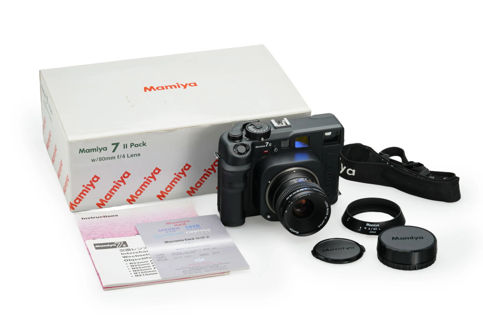 Mamiya 7 II Pack with 4/80mm: In almost mint condition and working order, this Mamiya 7 II outfit offers the pinnacle of 6x7 rangefinder photography. The camera body is clean and equipped with the standard 4/80mm lens(No. LB3008).