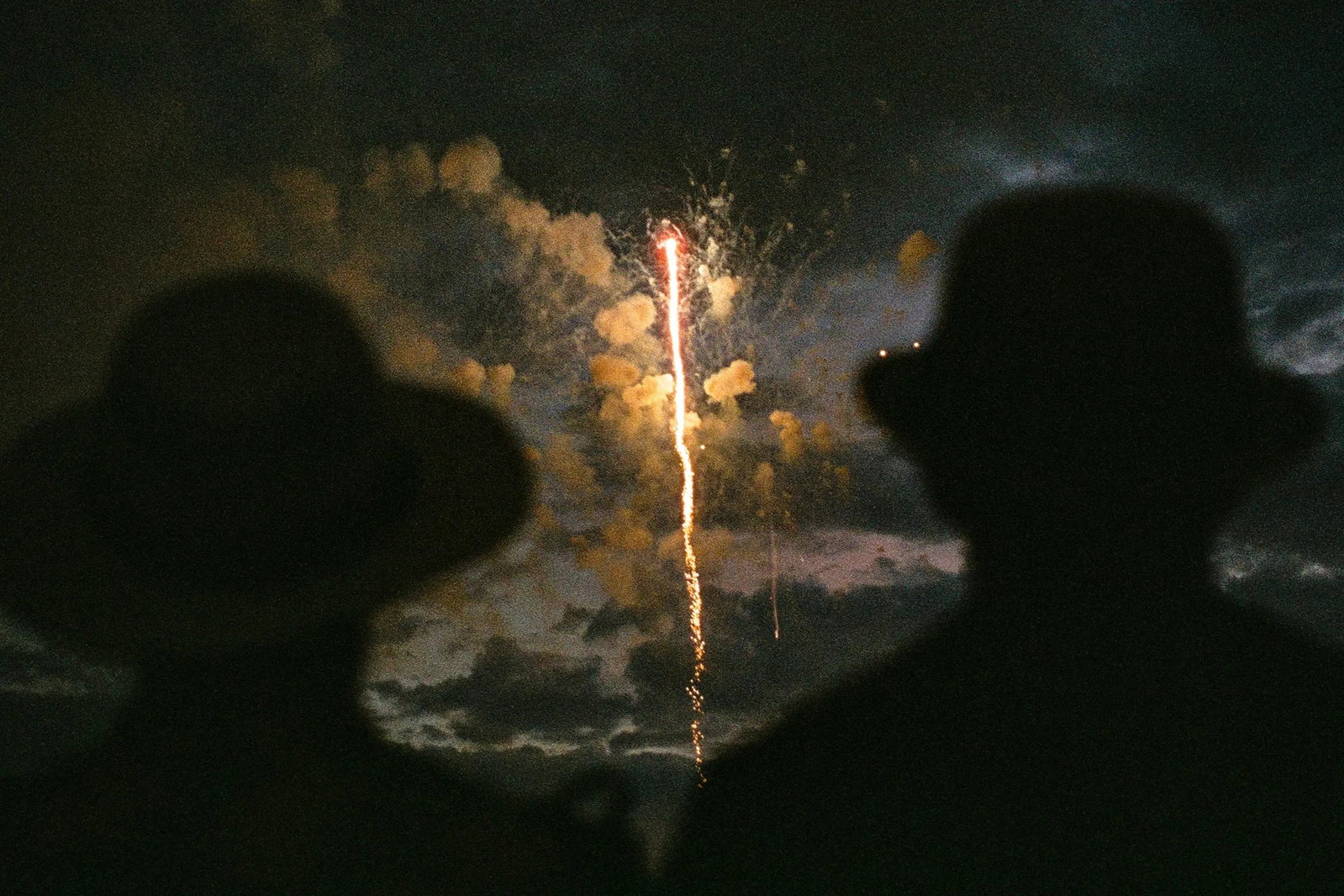 The Night We Looked Up: Location: Washington, D.C., USA Medium: Archival Pigment Print Edition: 2/5 + 2 AP Signature: Signed and numbered by the artist, framed This photograph was taken during the Independence Day fireworks 