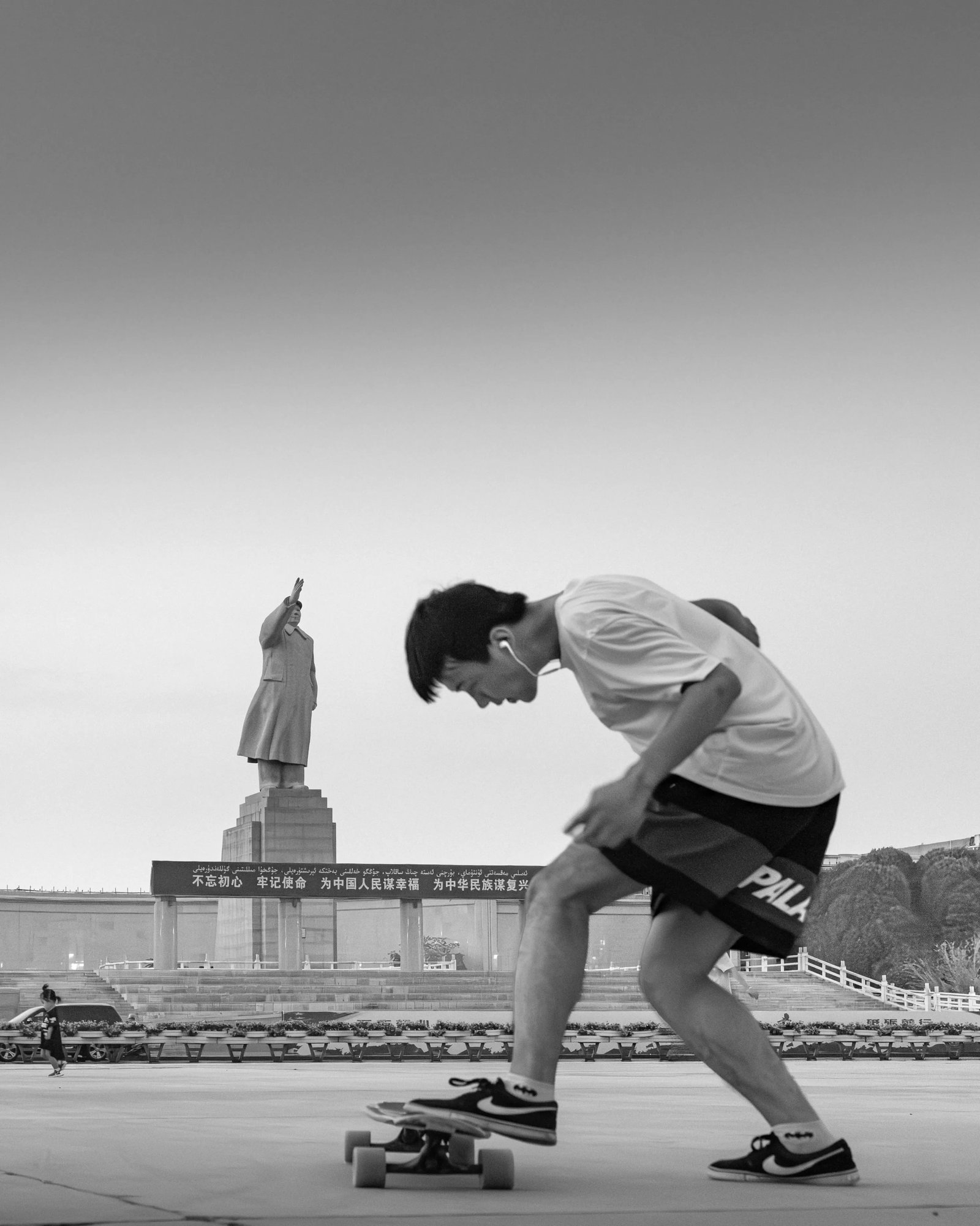 Skating Through Youth: Location: Kashi,Xinjiang Medium: Hahnemuhle acid-free 100% cotton baryta paper Technique: Epson fine art giclee print Edition: 1/10 Framing: Black Brushed Frame with Acrylic Panel Signature: Signed by