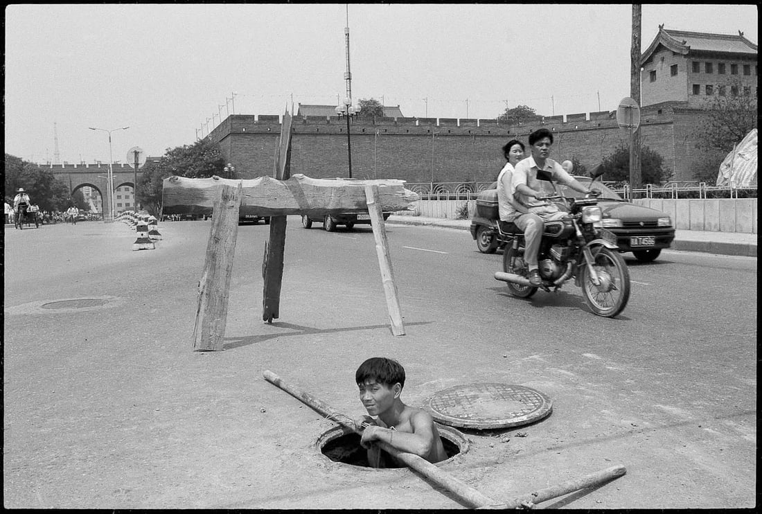 High Sun, from the End of the Century Series: Print Date: 2026 Location: Outside the South Gate, Xi'an Medium: Gelatin silver print Edition: 1/8 Signature: Signed by the artist High Sun was photographed in 1996 outside the South Gate of Xi'an.