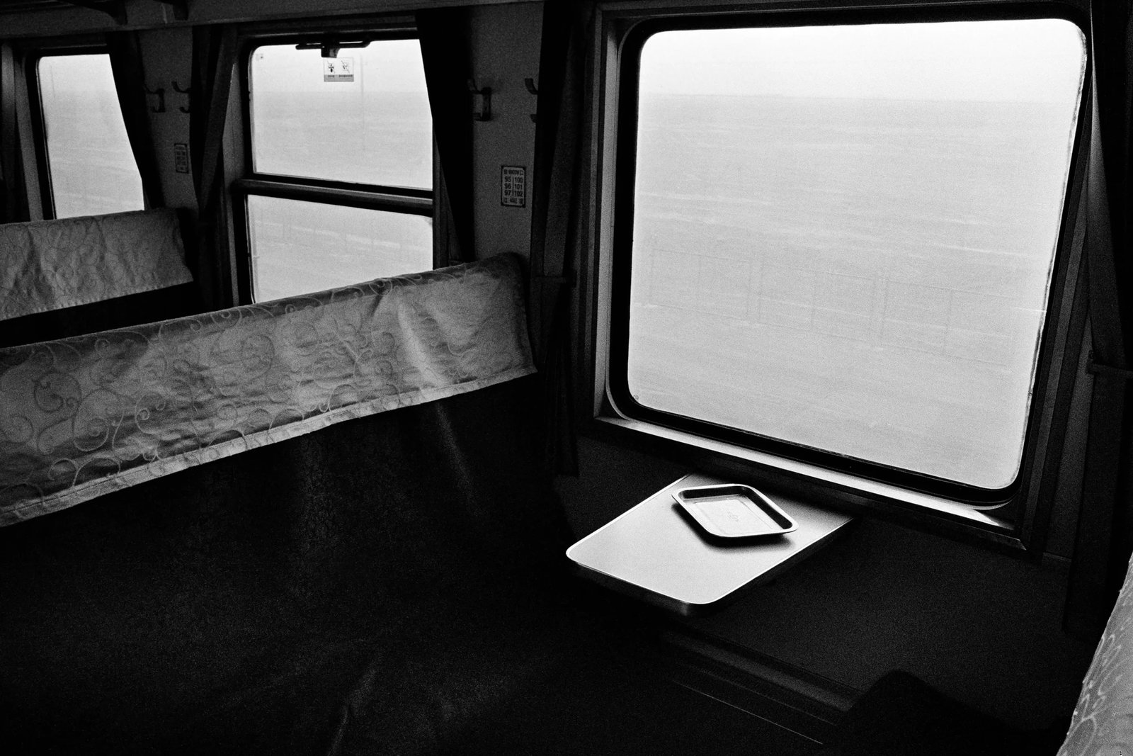 The Train Passing through Guazhou: Print Date: 2026 Medium: Gelatin silver print Edition: 1/5 Signature: Signed by the artist The Train Passing through Guazhou was photographed shortly before the Spring Festival of 2016 on a train from