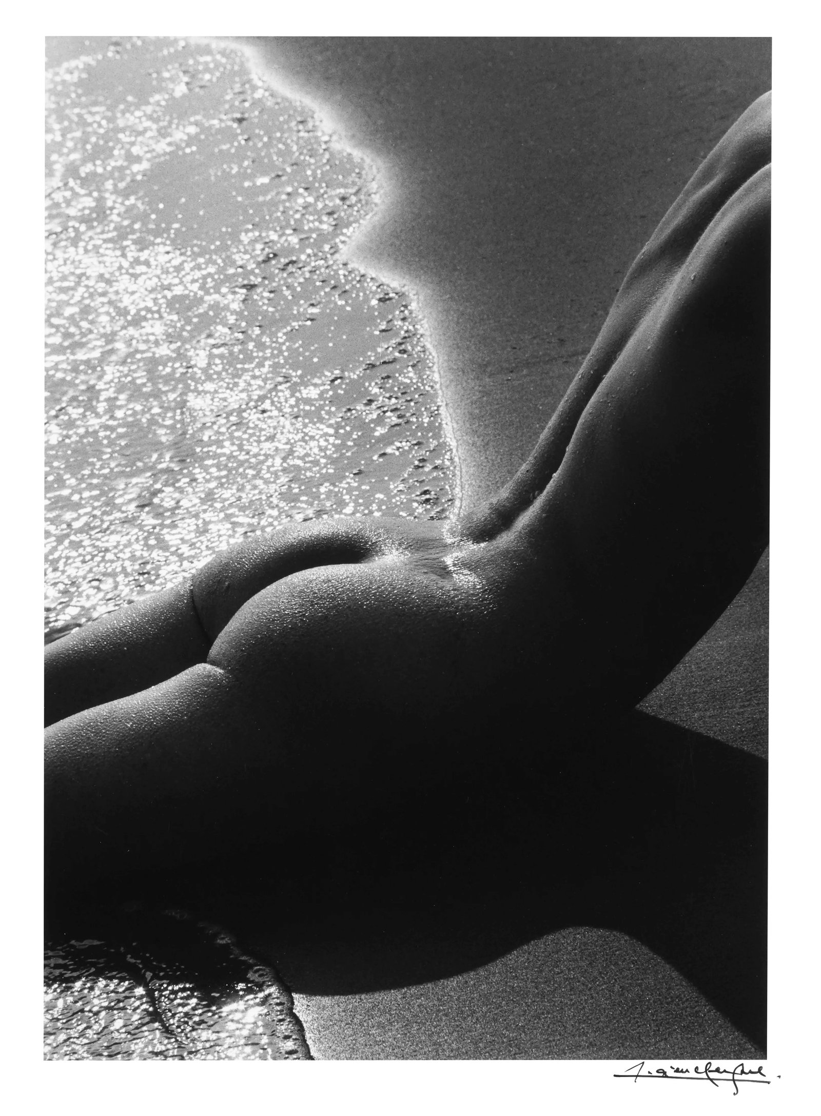 Nu de la plage: Print Date: circa 1990, printed by the artist Medium: Gelatin silver print Edition: 26/30 PF Signature: Signed by the artist lower right on recto; inscribed, dated, titled, located, editioned, and