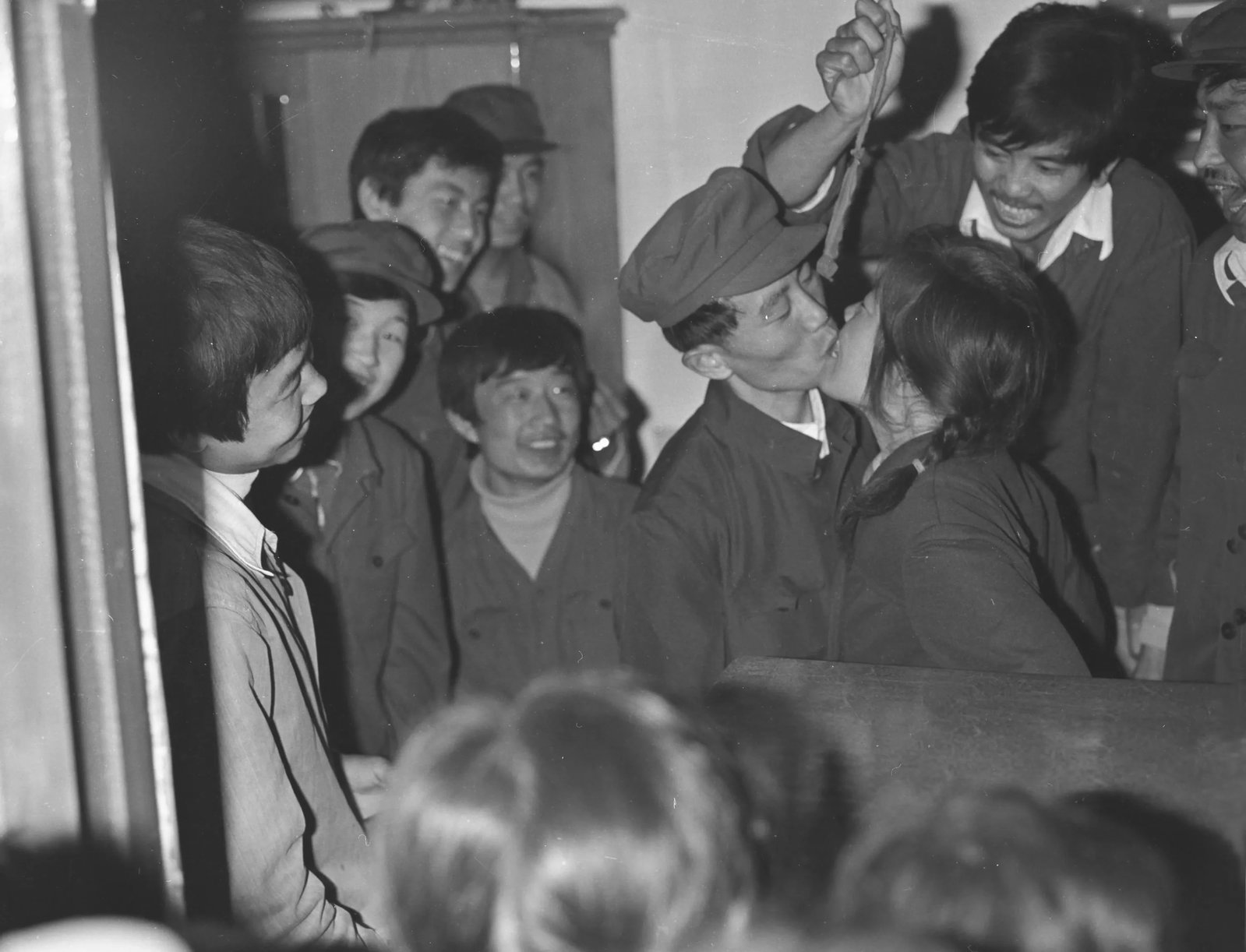 A Miner's Wedding: Series: Humanism in China, No. 548 Medium: Gelatin silver print Edition: 1/20 Signature: Signed by the artist A Miner's Wedding was photographed in 1975. In the image, a newlywed couple kiss amid the 