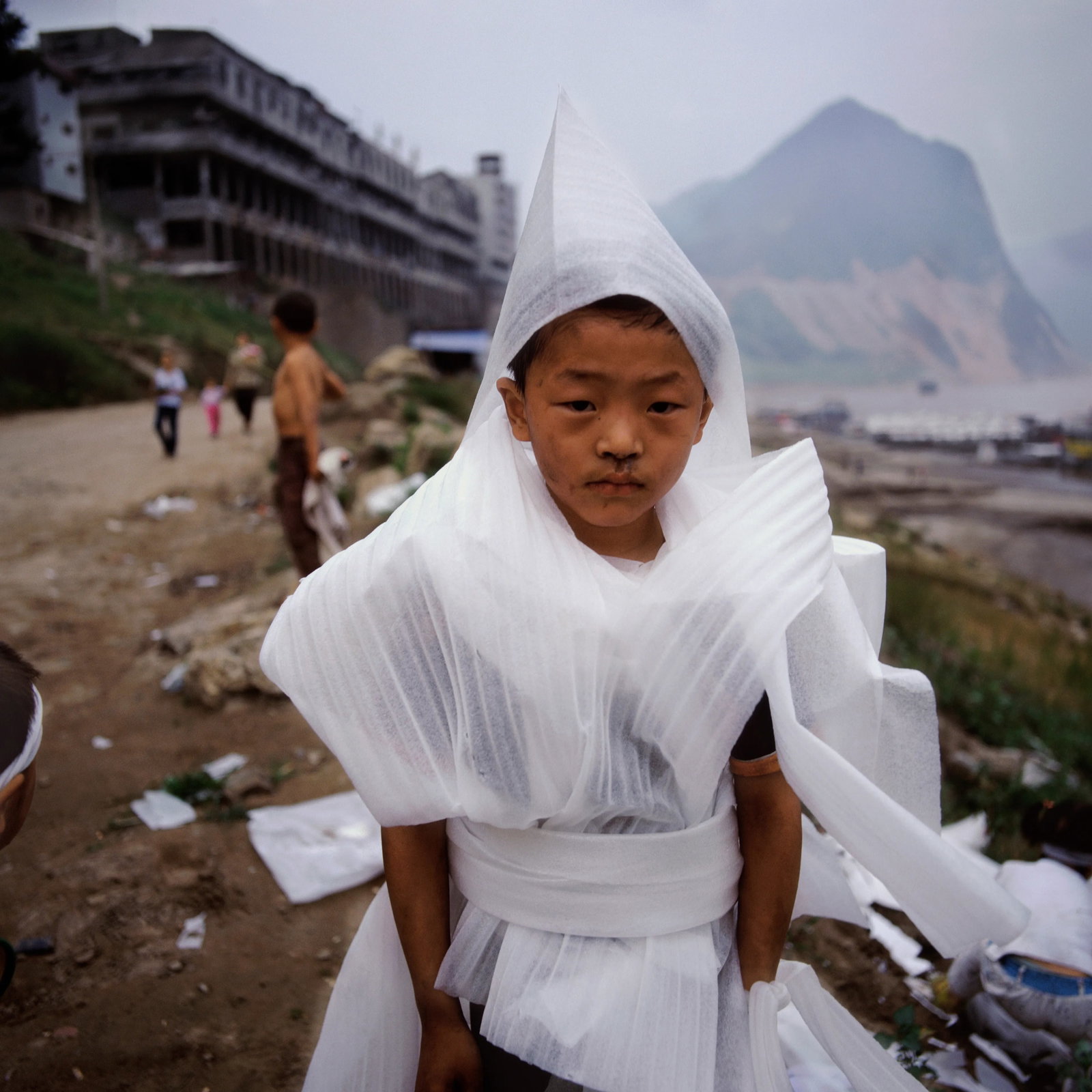 A Boy at Play: Series: Three Gorges Series No.29; Humanism in China, No.337 Print Date: 2026 Location: Wushan County Town Medium: Archival print Edition: 3/12 For the artist, the Three Gorges is both his homeland