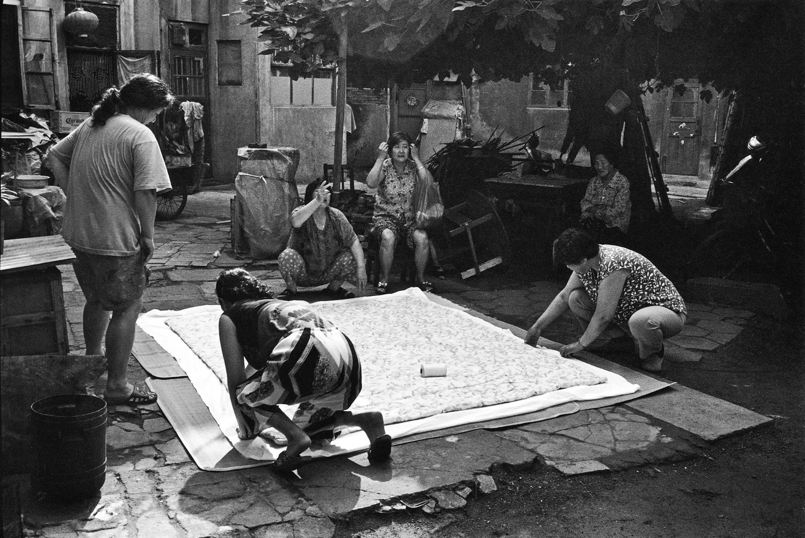No. 10 Courtyard Series: Series: Humanism in China, No. 476-2 Caption: Lin Xiangzhen's daughter is getting married, and neighboring women have come to help with the preparations. Camera: Leica M6 with 28mm lens Medium: