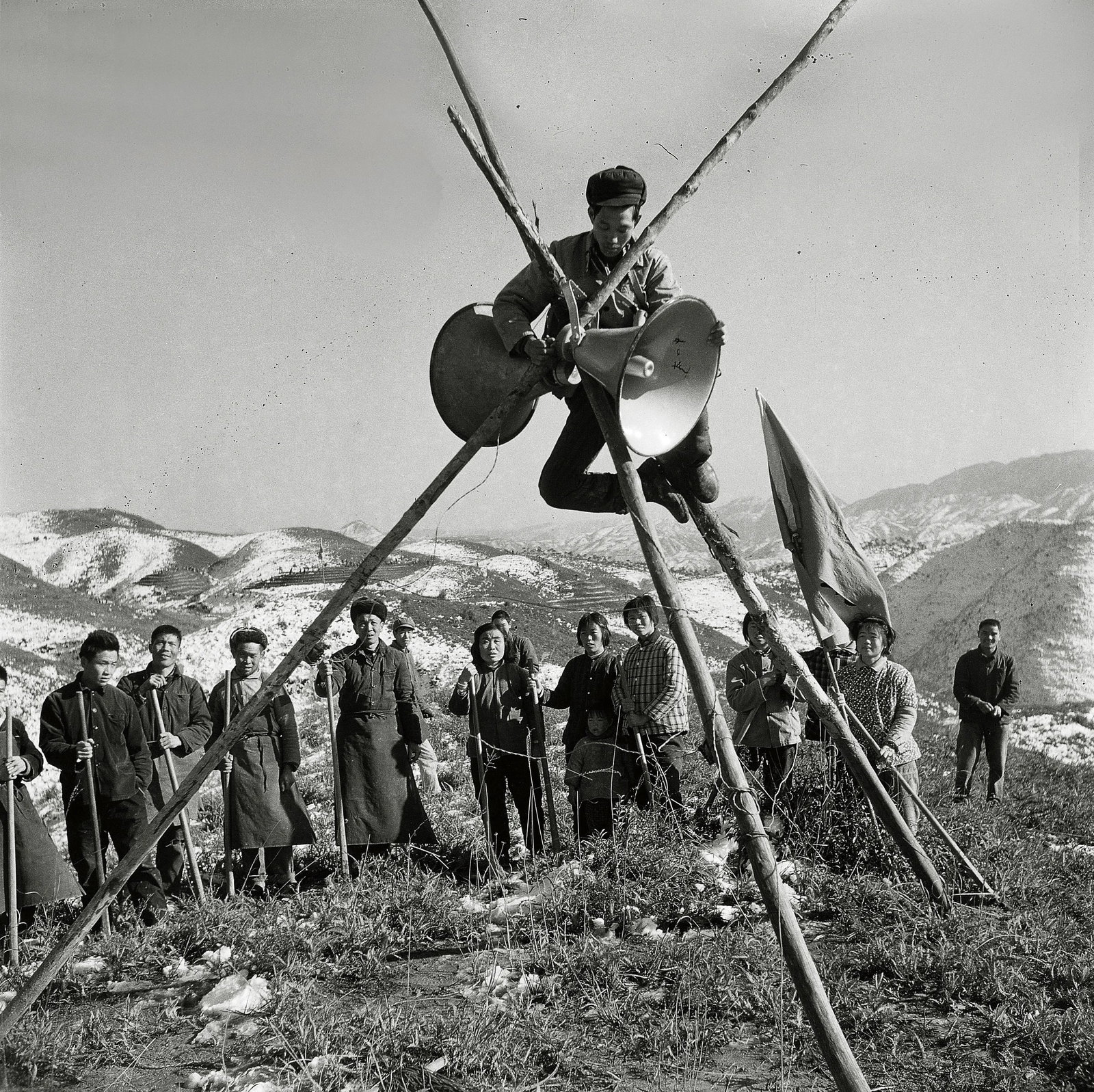 Loudspeaker Propaganda for Opening Hillsides into Farmland: Series: Humanism in China, No. 537 Medium: Digital giclee print Edition: 1/10 Signature: Signed by the artist Loudspeaker Propaganda for Opening Hillsides into Farmland records, through a scene rich