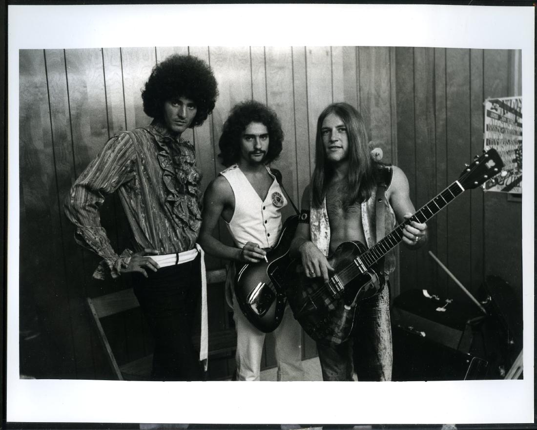 Grand Funk Railroad 8 x 10 Photo by Joe Sia: By the famous Woodstock and Rock n Roll photographer Joe Sia. Stamped on the back. Mint.