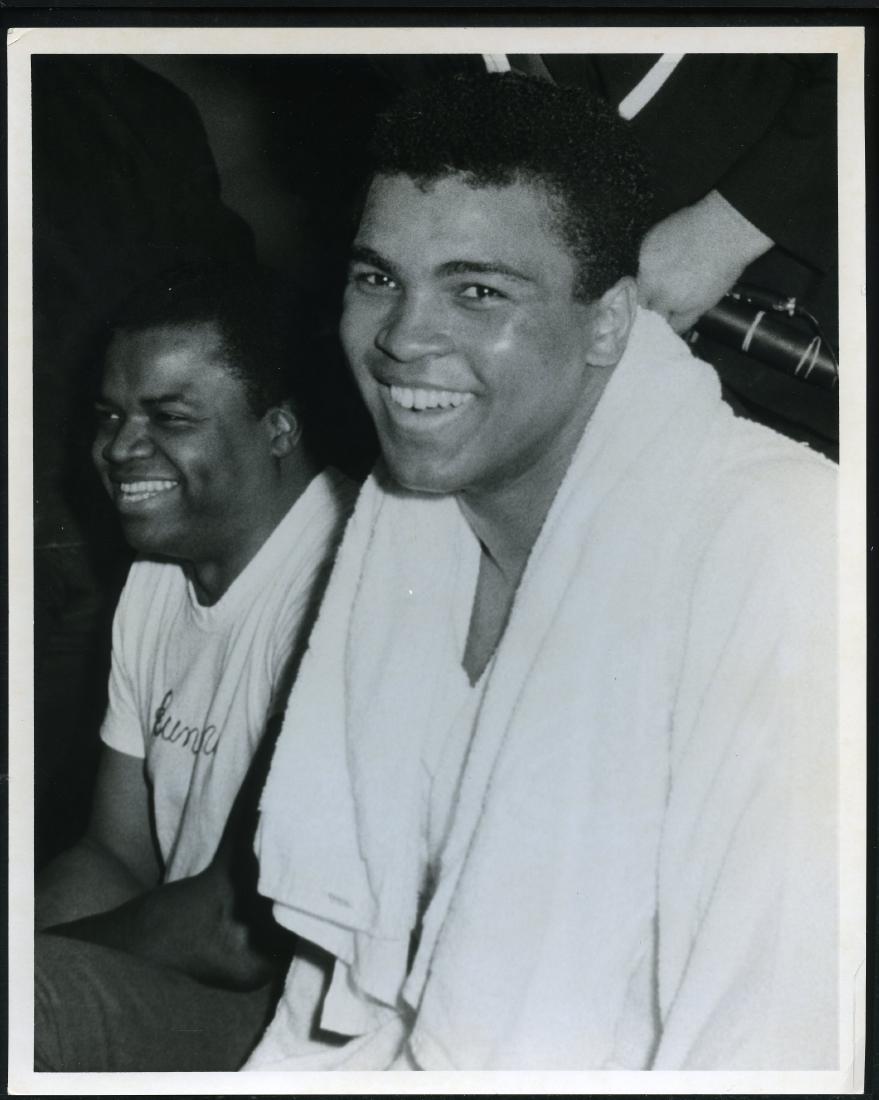 Muhammad Ali Bundini Brown 8 x 10 Original Photograph: From the Sport Magazine archive. Printed on thick double weight stock. One of a kind vintage original photo. Near Mint to MINT.