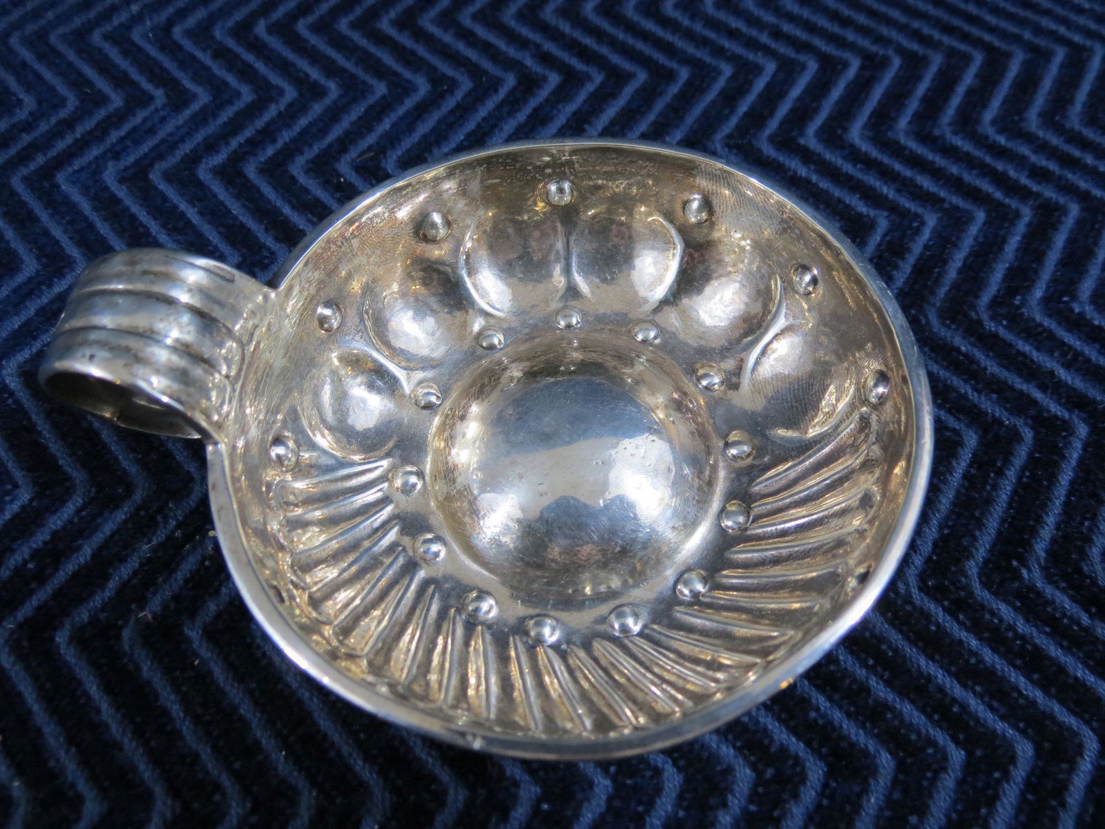 Sterling Silver Wine Taster Cesar Tonnelier Circa 1850: C/T in diamond hallmark. Portrait sterling silver guarantee mark. 3.25 inches diameter. 4 inches from handle to rim. Fine condition. Weight is 2.31 troy ounces.