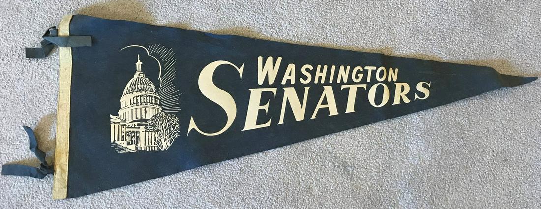 1950s WASHINGTON SENATORS Full Size Soft Pennant: This Washington Senators pennant measures 29 inches from side to side. Â It is free of any holes and/or tack marks. Â The top edge is wavy from storage and there is some staining mostly on the rig