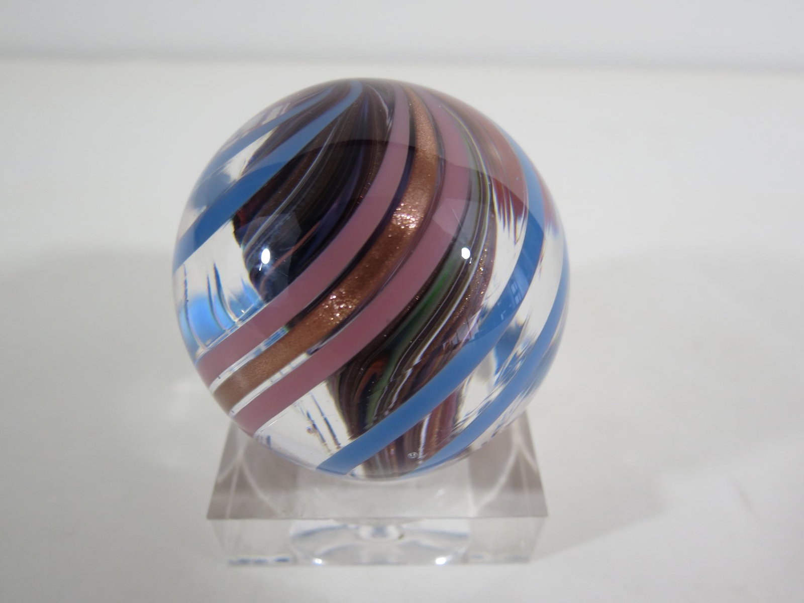 Art Glass Multi Colored Swirl Marble 40MM: Larger size marble at 40MM in diameter. No makers markings. Polished pontil. There is a small burst bubble on the surface (very small). No chips, cracks or dings. Beautiful marble.