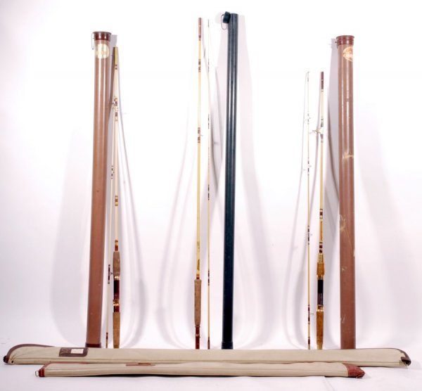 (4) Ted Williams Co Fishing Rods w/ Holders: Five pieces in this lot. (4) Fishing Rods with the original cases and one case without Rod. Excellent condition.