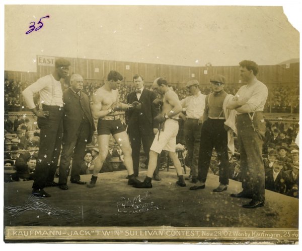 1907 Al Kaufmann vs Jack Sullivan Boxing Photo by D: Vintage 6 x 7.5ÕÕ photograph of the Al Kaufmann vs Jack Twin Sullivan Contest November 28, 1907. There is a raised seal by 'DANA" of San Francisco at the bottom. The number '35" is written in ink in