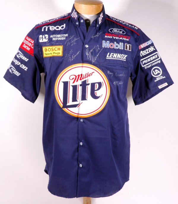 Rusty Wallace & More Signed NASCAR Crew Shirt: NASCAR garage crew shirt signed by Rusty Wallace, Ryan Newman, and Newman's garage crew. Shirt has patch logos for several sponsors with the main bein Miller Lite. There is also a NASCAR Winston Cup S