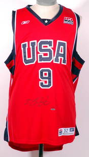 Lebron James Signed Olympic Jersey UDA: Reebok size 52 Olympic jersey has been signed in Mint black ink by the superstar. The jersey is limited edition number 58 of 123. The jersey is unworn and Mint. Accompanied by an LOA and box from Uppe