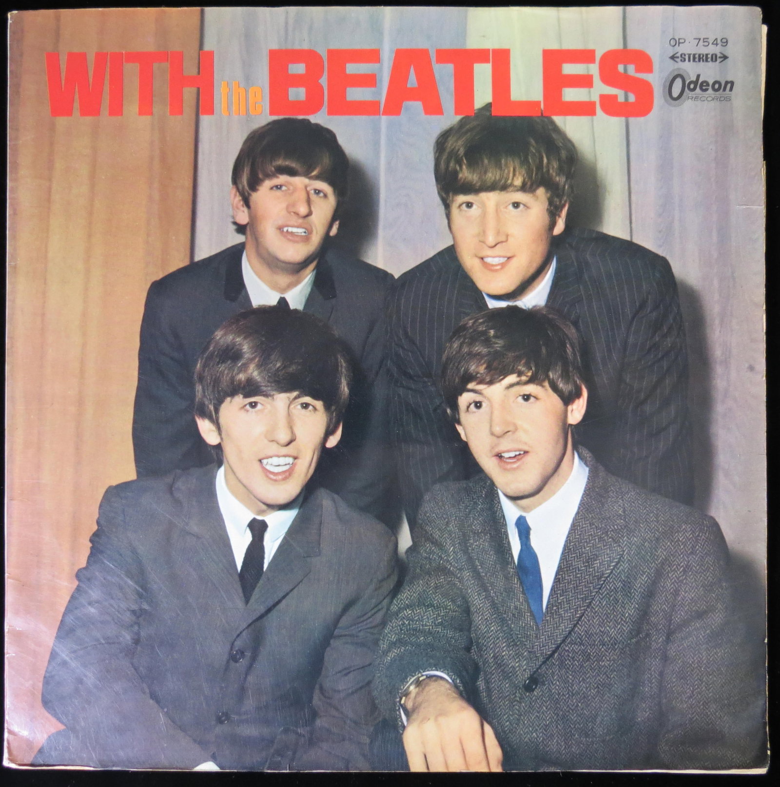 The Beatles With the Beatles Album - Red Vinyl - Oden Japanese Import: 12 inch. OR 7549 Oden. Red Vinyl. There is an interior booklet, the first page of the booklet is detached, but present. Cover VG+, Album VG+