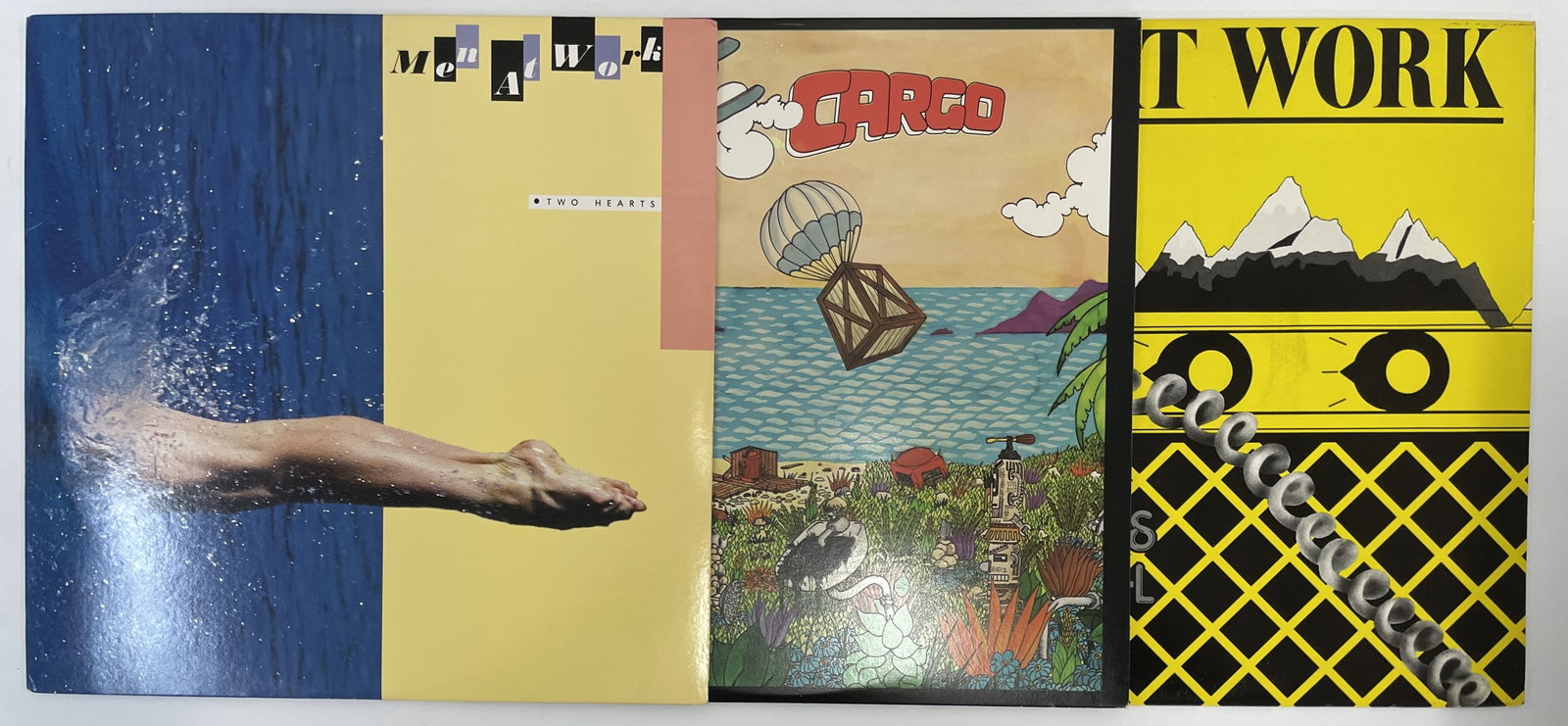 (3) MEN AT WORK Record Albums: Albums included: Two Hearts, Cargo, Business as Usual. Records will all come in their original jackets and most with the original paper sleeves inside. All show only light use.