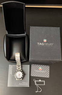 TAG Heuer Formula 1 Stainless Steel Watch – Swiss Made: Classic TAG Heuer Formula 1 men's watch, a timepiece that exemplifies sporty elegance and Swiss precision. This model features a stainless steel case and bracelet, paired with a bold unidirectional bl