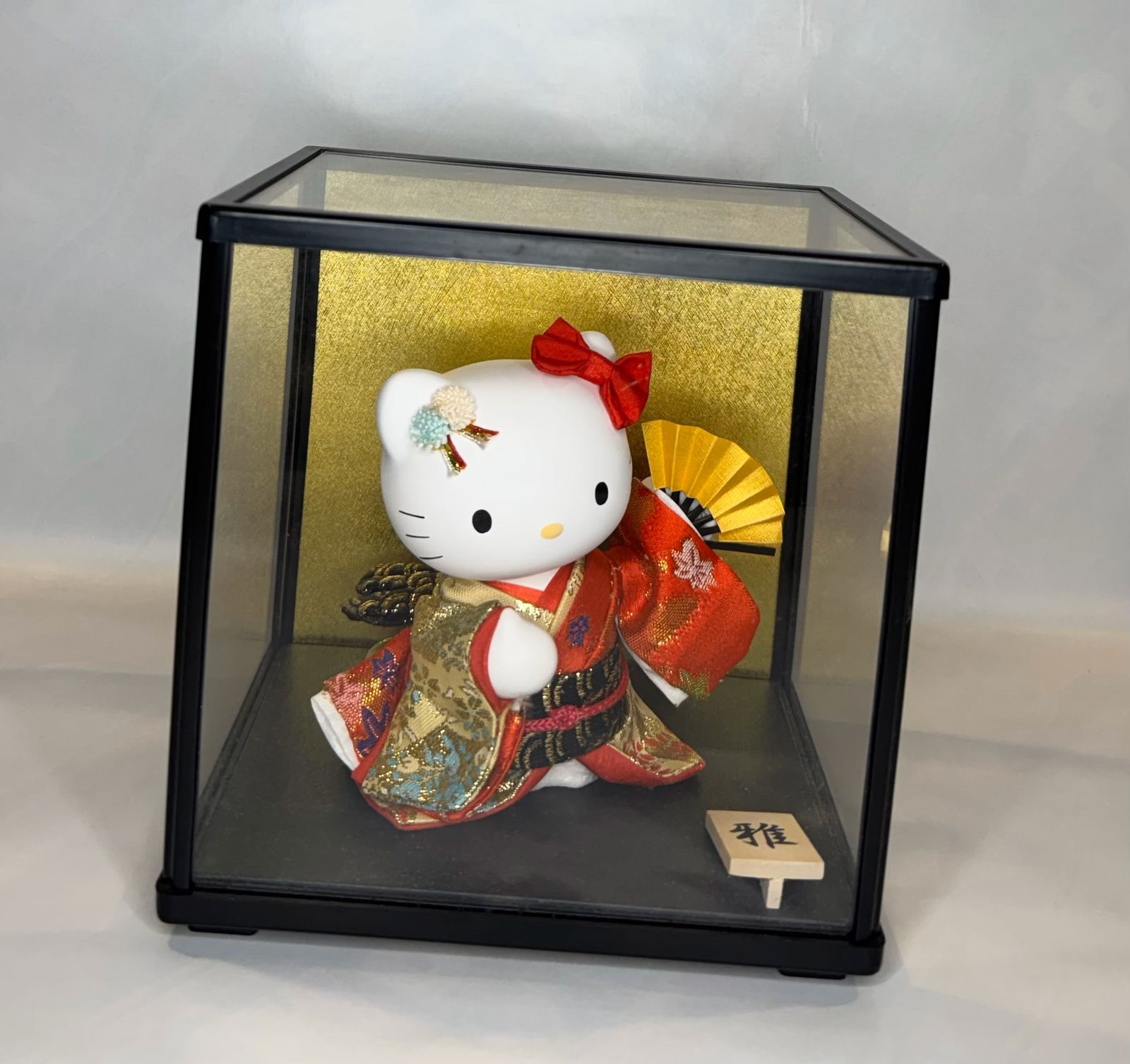 Limited Edition Hello Kitty in Traditional Japanese Kimono, with Display Case: An utterly charming and elegant collectible figurine of Hello Kitty dressed in a traditional Japanese kimono, presented in a ceremonial-style display case reminiscent of the Hinamatsuri (Japanese Doll