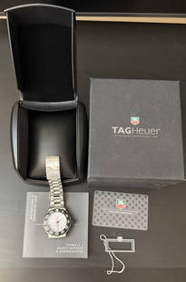 TAG Heuer Formula 1 Stainless Steel Watch – Swiss Made: Classic TAG Heuer Formula 1 men's watch, a timepiece that exemplifies sporty elegance and Swiss precision. This model features a stainless steel case and bracelet, paired with a bold unidirectional bl