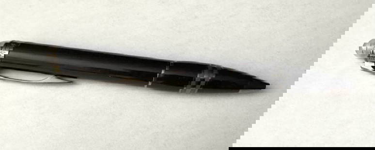 Montblanc StarWalker Black Mystery Ballpoint Pen: Montblanc StarWalker Black Mystery ballpoint pen. This pen is part of Montblanc&#8217;s highly sought-after StarWalker collection,and features a high-gloss black resin barrel and cap, elegantly accent