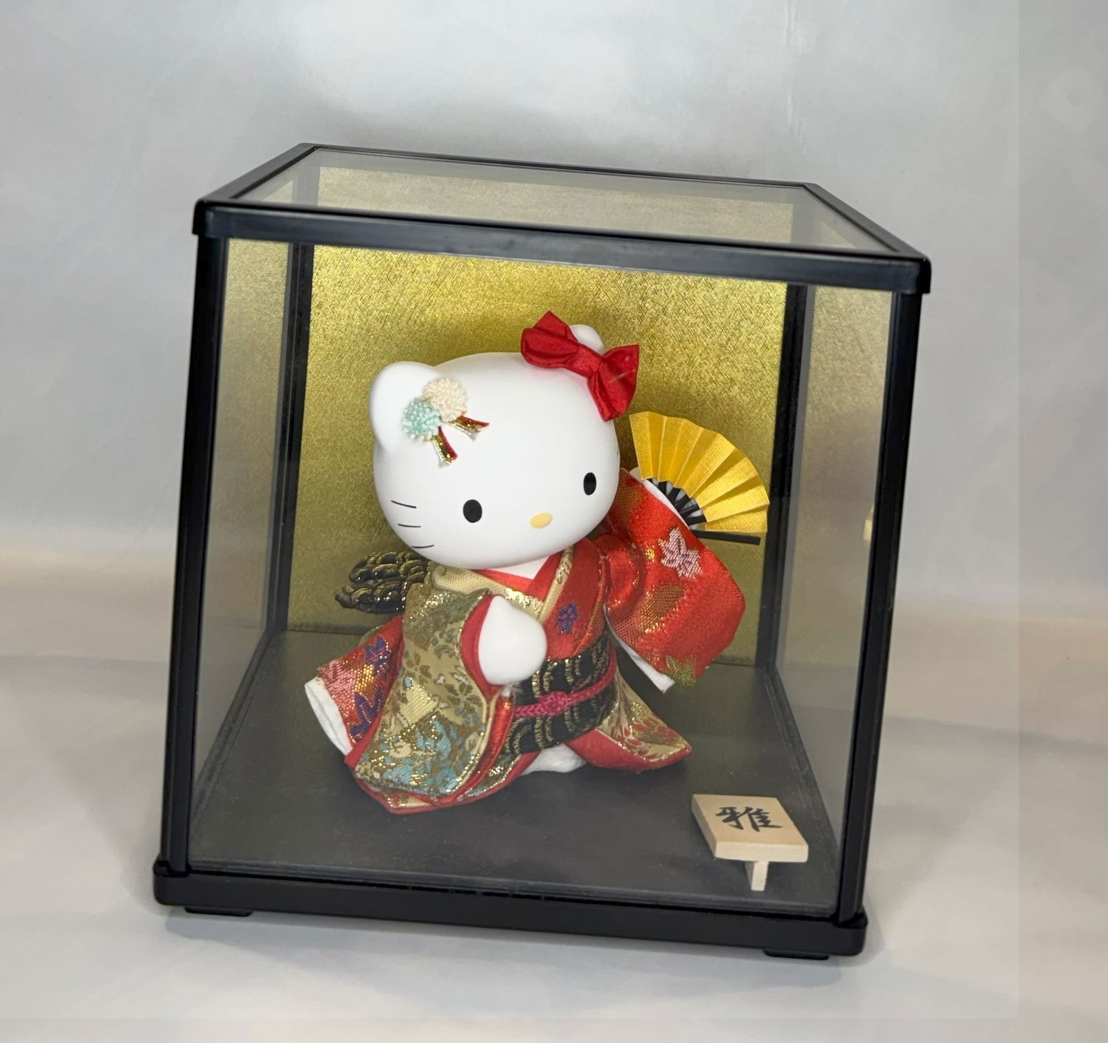 Limited Edition Hello Kitty in Traditional Japanese Kimono, with Display Case: An utterly charming and elegant collectible figurine of Hello Kitty dressed in a traditional Japanese kimono, presented in a ceremonial-style display case reminiscent of the Hinamatsuri (Japanese Doll