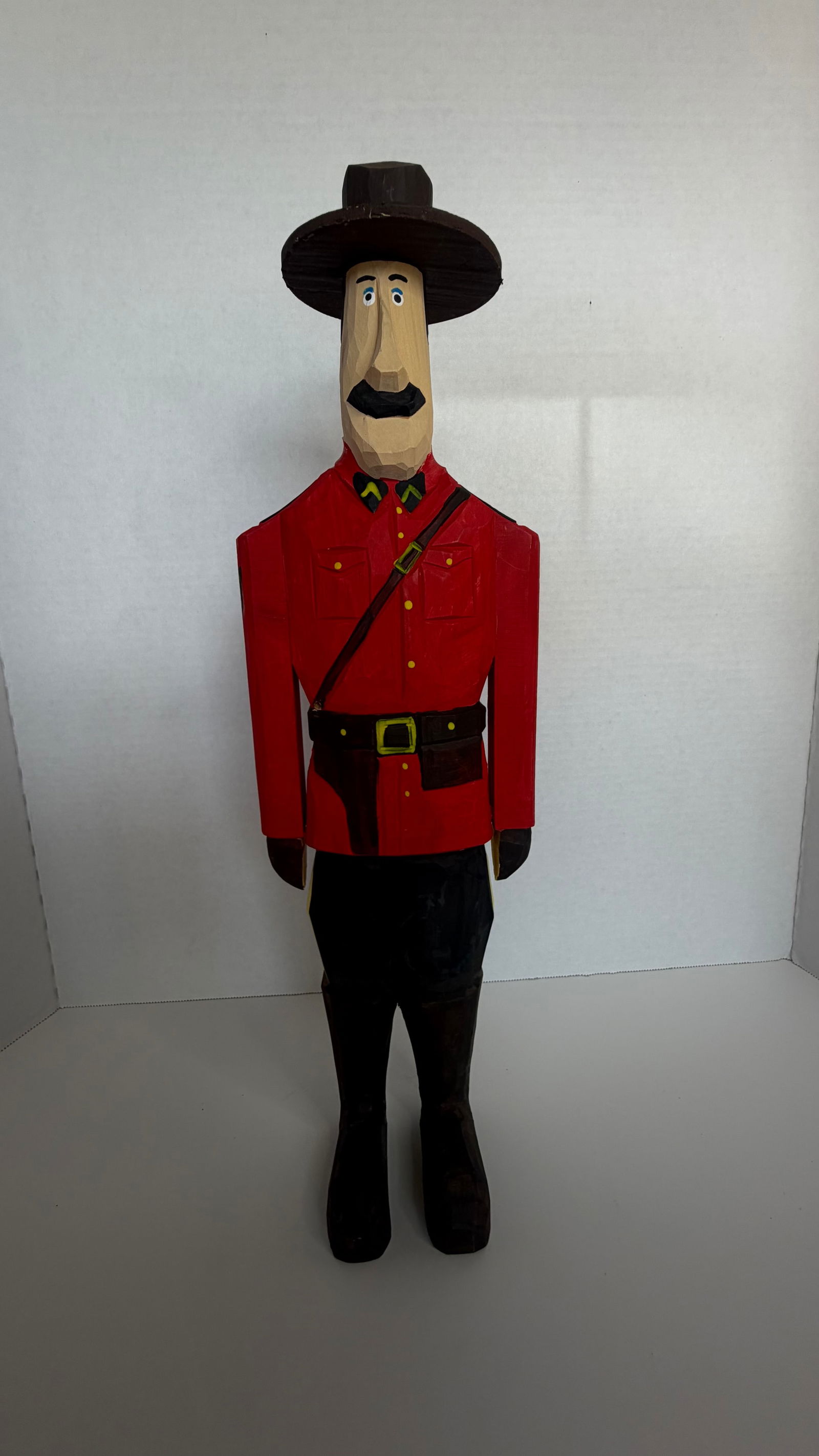 Folk Art Woodcarving of Royal Canadian Mounted Police Officer (“Mountie”) (1 of 2)