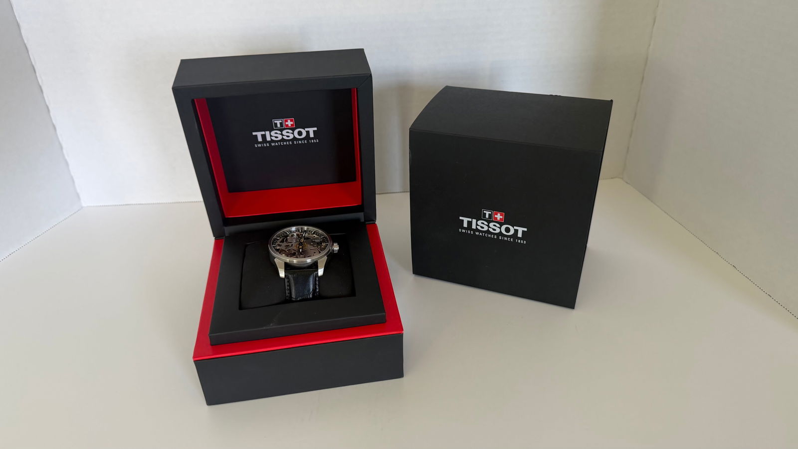 Tissot T-Complication Squelette; Swiss Hand-Wound Mechanical Skeleton Watch (Complete Set): Tissot T-Complication Squelette features an intricately skeletonized dial that puts the heart of the movement on full display. A modern homage to traditional Swiss watchmaking, this timepiece is both