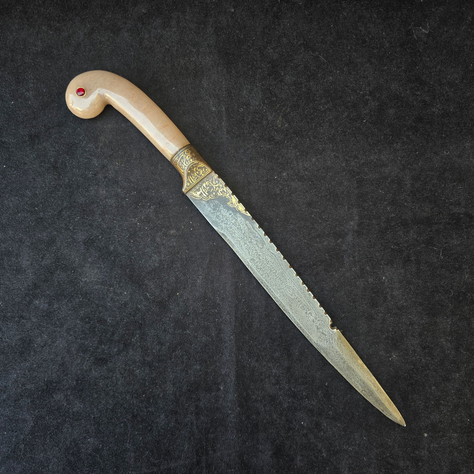 Indian Mughal style quartz damascus Kard dagger: Indian Mughal style Brown quartz pistol grip handle with Damascus blade with gold inlaid motif and Islamic calligraphy work on blade and on bolster. Length= 15.5 inches approx.