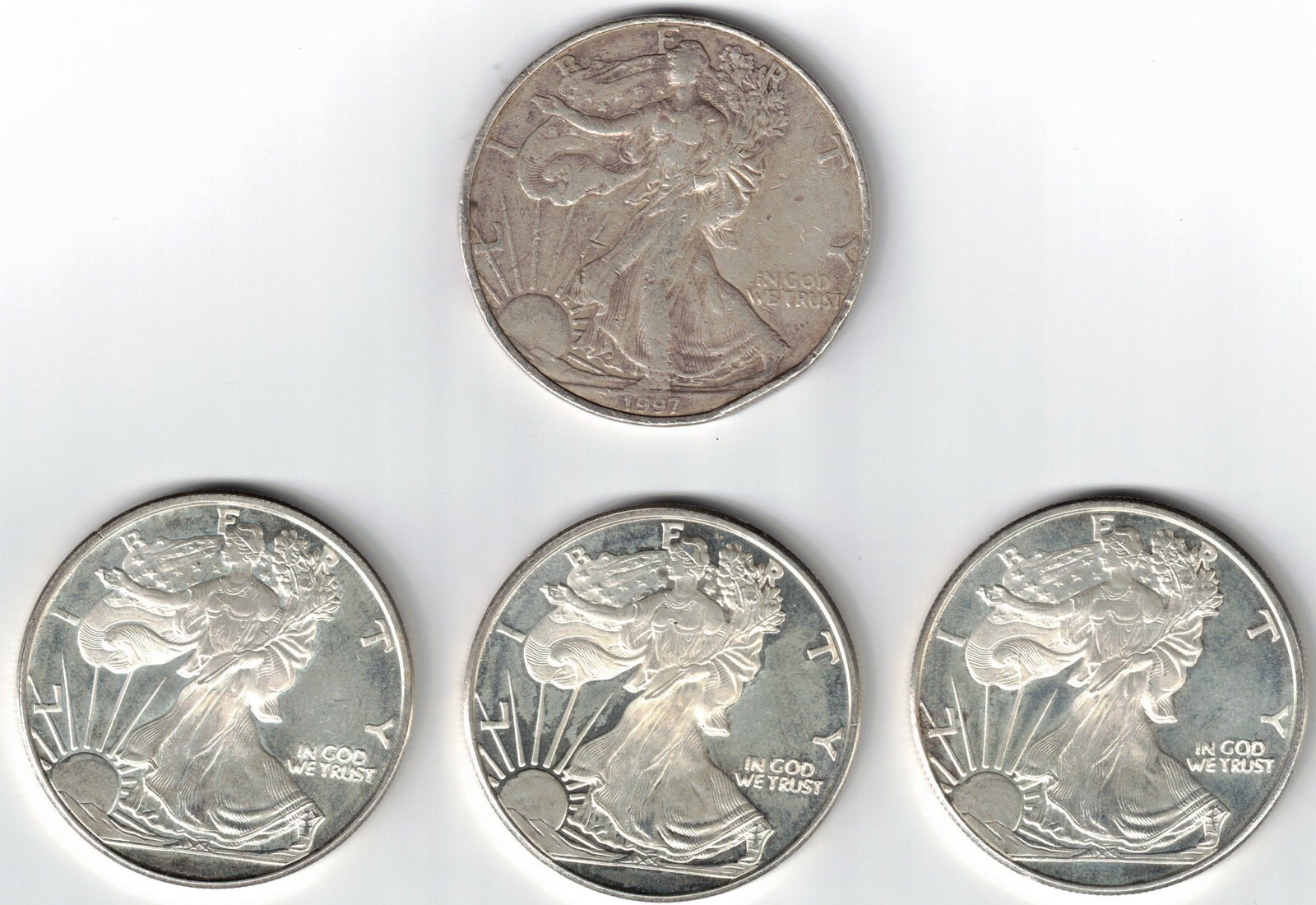 1997 American Silver Eagle and Three Fine Silver Rounds (1 of 2)