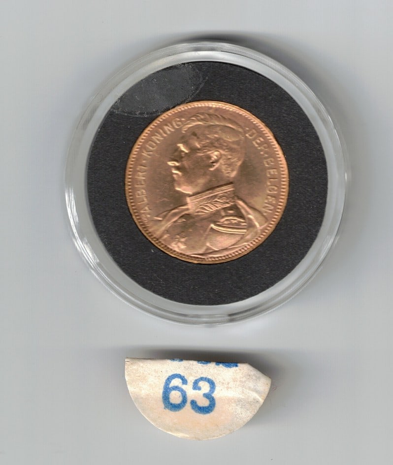 1914 20 F. Belgium Albert Koning Gold Coin, 0.1867 Troy Oz. Fine Gold: MS63 according to the sticker on the storage capsule. Please read “Auction Details” / “Terms of Sale” for preview, payment, pickup, shipping and other instructions. Lot include