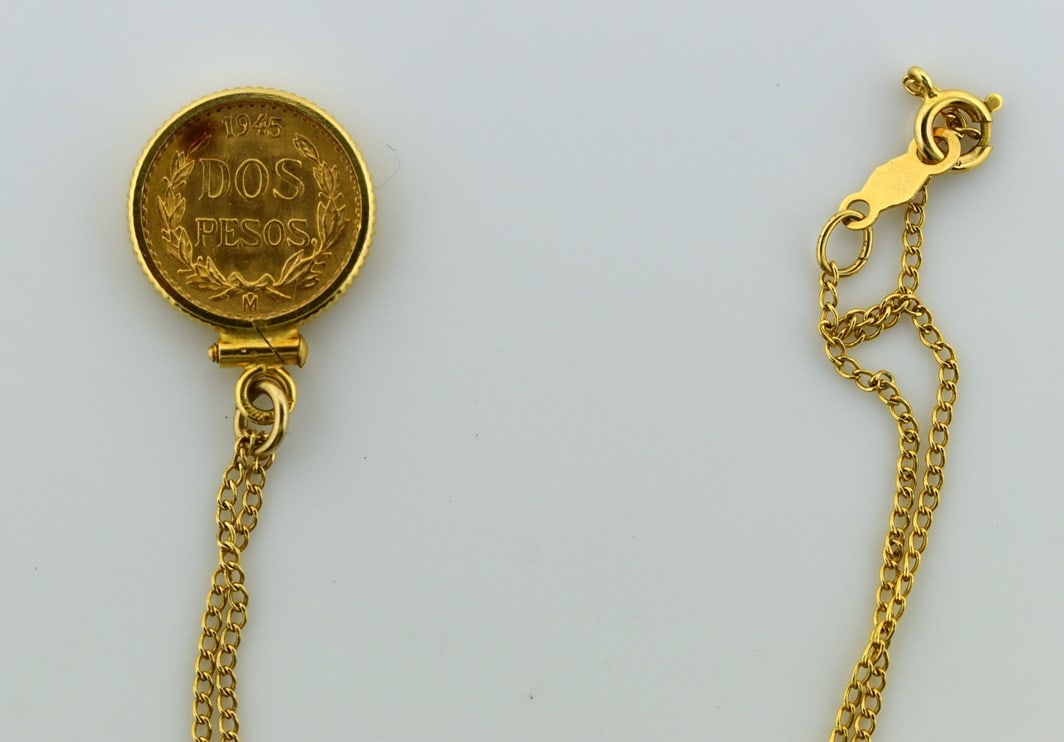 1945 Mexico Dos Pesos Coin (0.0482 Troy Oz. Fine Gold) in 10K Pendant Frame & 14K Gold Chain: Weight of 10K pendant frame is 0.6 g. Weight of 14K chain is 1.0 g. Please read “Auction Details” / “Terms of Sale” for preview, payment, pickup, shipping and other instruction